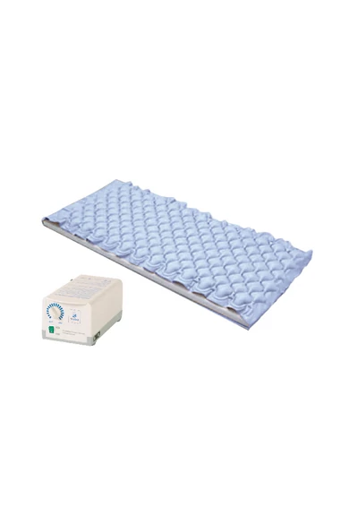 Váltakozó nyomást biztostó alátét és kompresszor